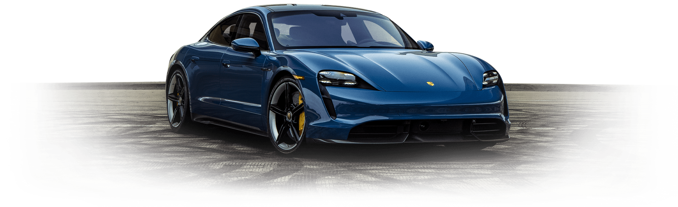 porsche-taycan Front angled view of an Porsche Taycan electric vehicle